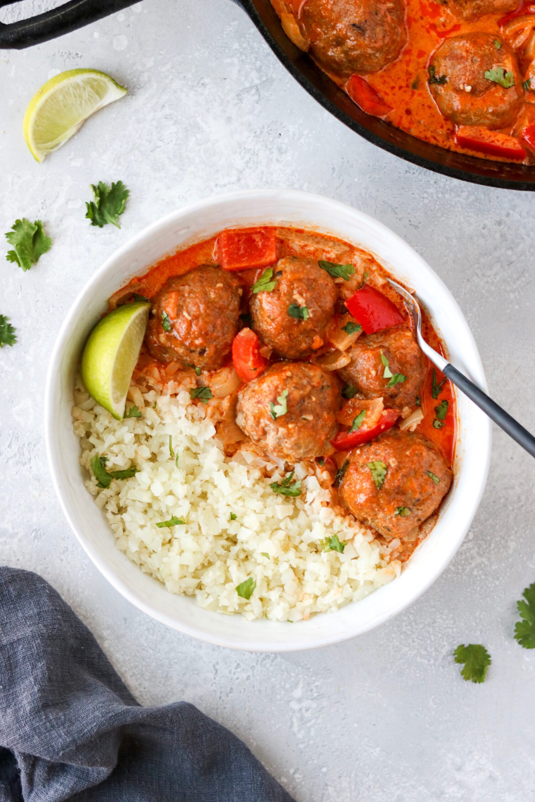 coconut curry gluten free thai meatballs in sauce in a bowl 