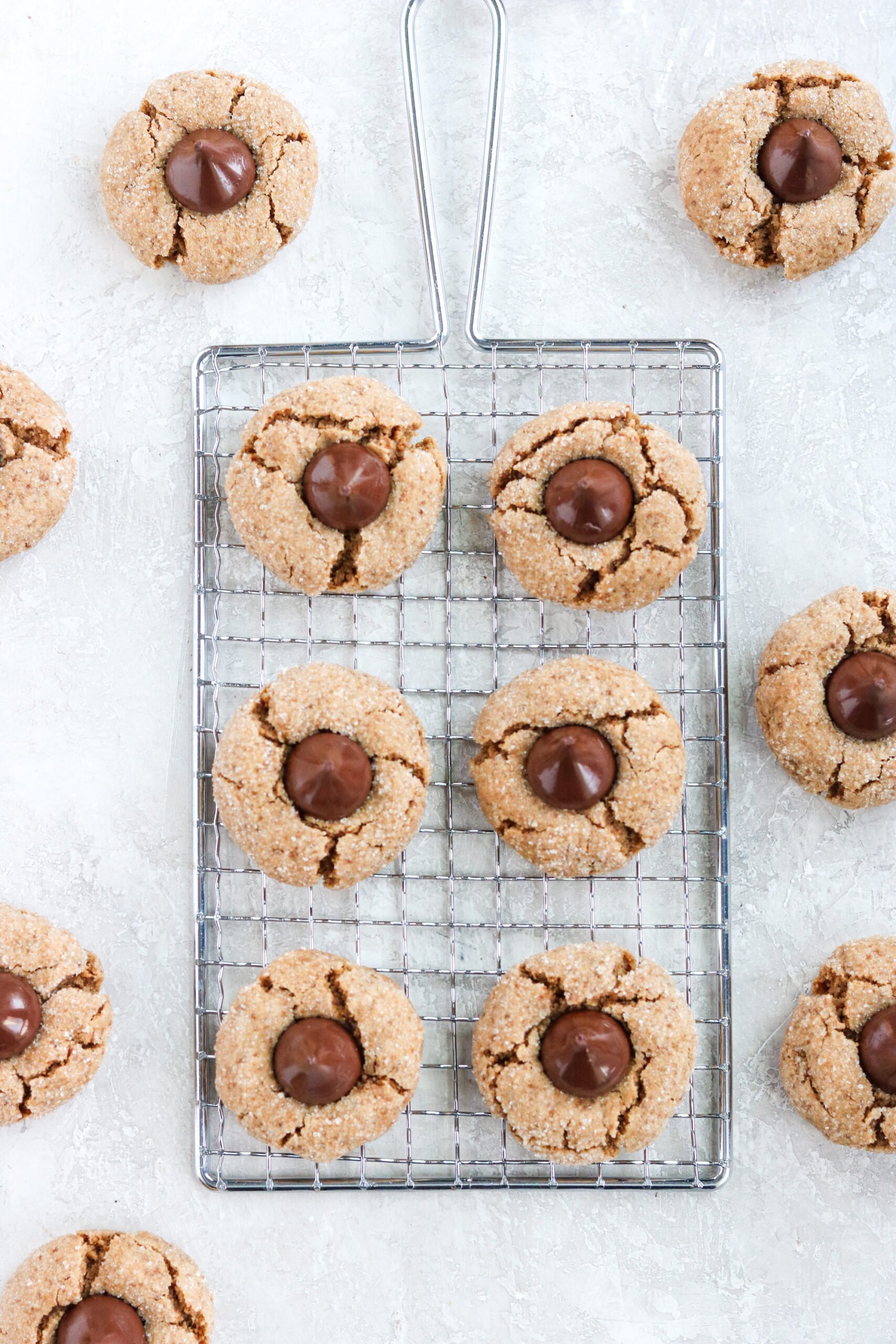 Peanut Butter blossoms made with gluten free ingredients on a cooling rack