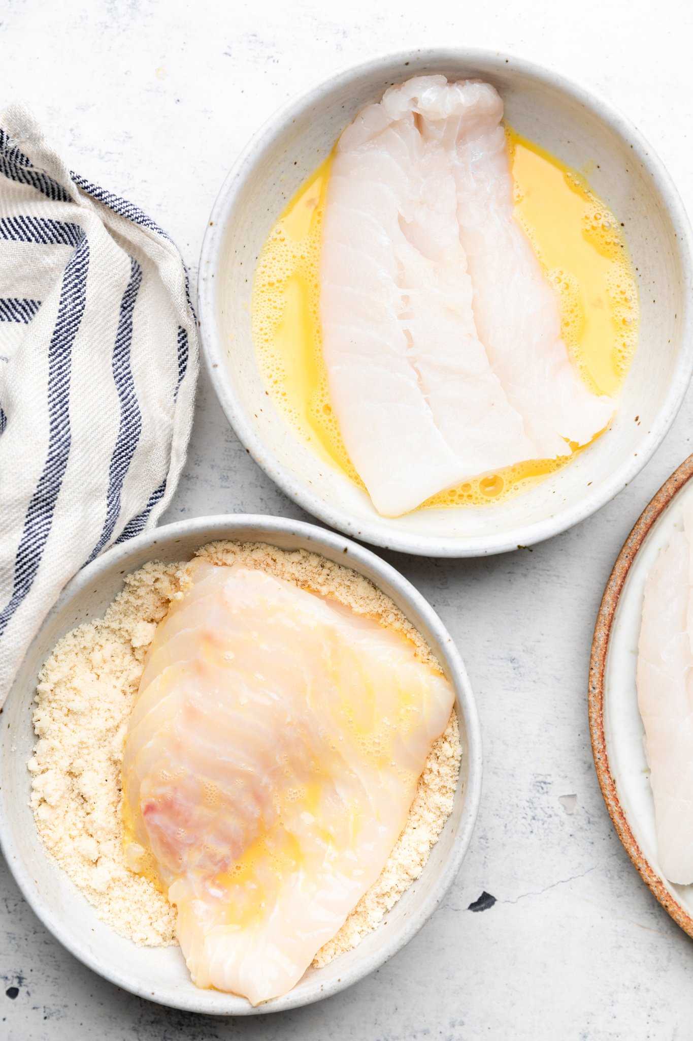 cod fillets dipped in egg and almond flour