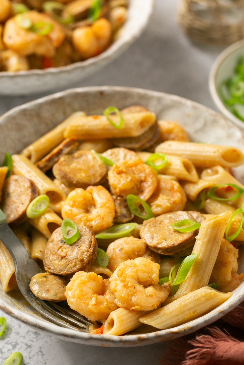 a closeup side view of cajun shrimp and sausage pasta