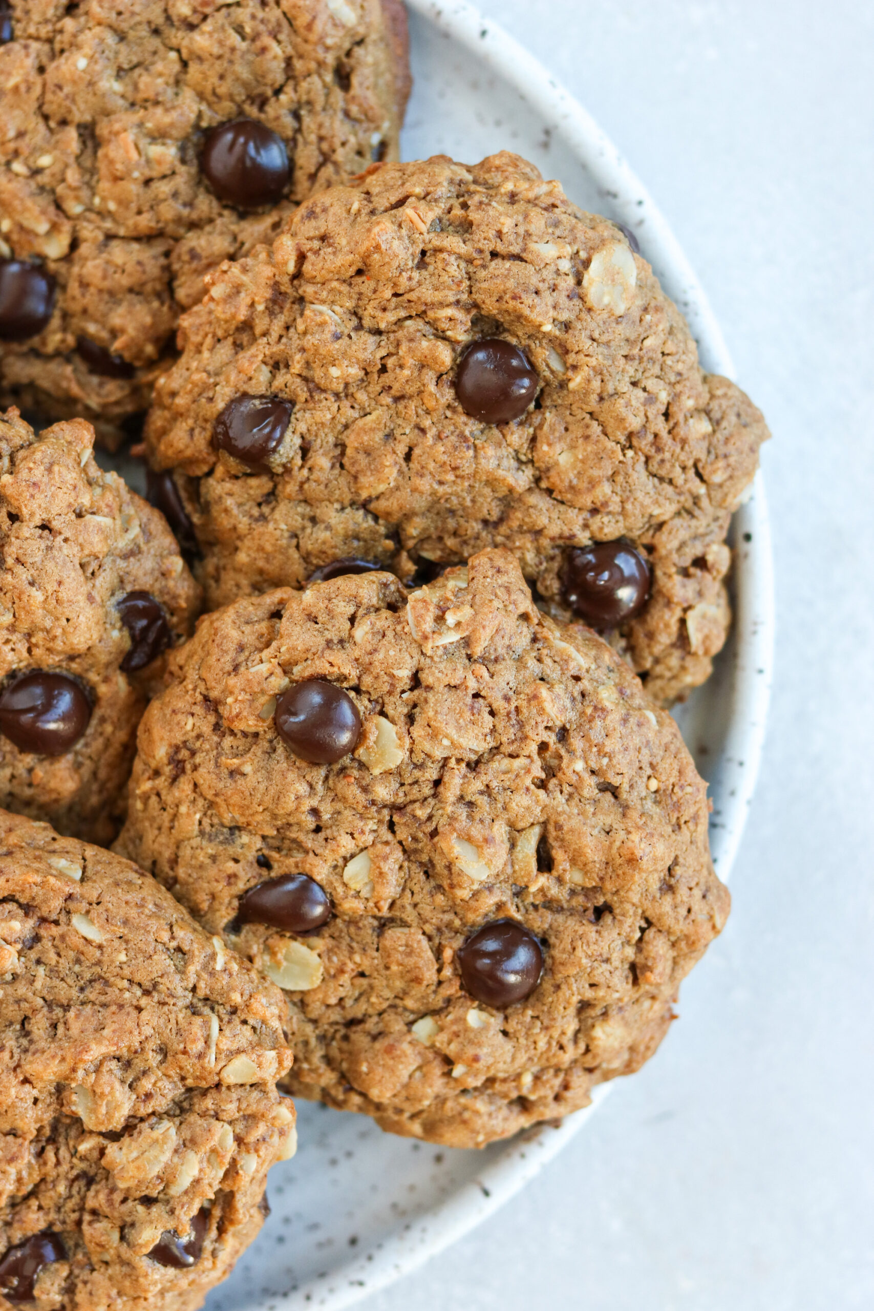 gluten free almond butter chocolate chip oatmeal cookies on a plate