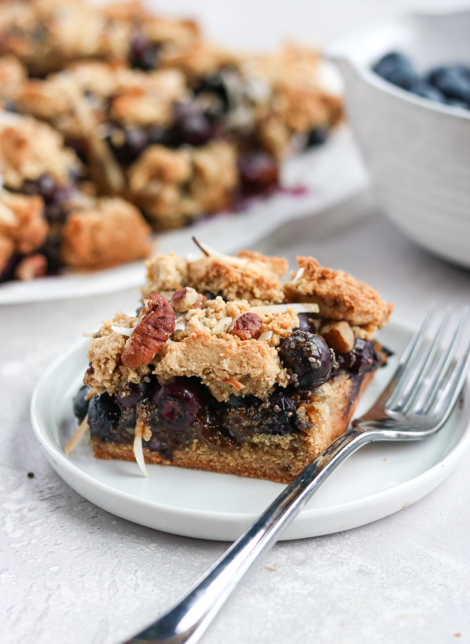 Crumb Bar made of Blueberry in a white plate with fork
