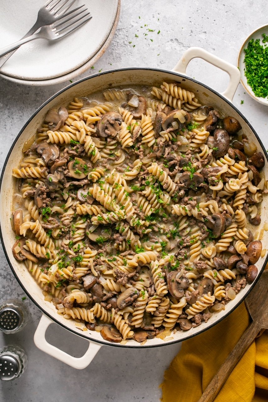 hamburger helper stroganoff in a pot topped with parsley