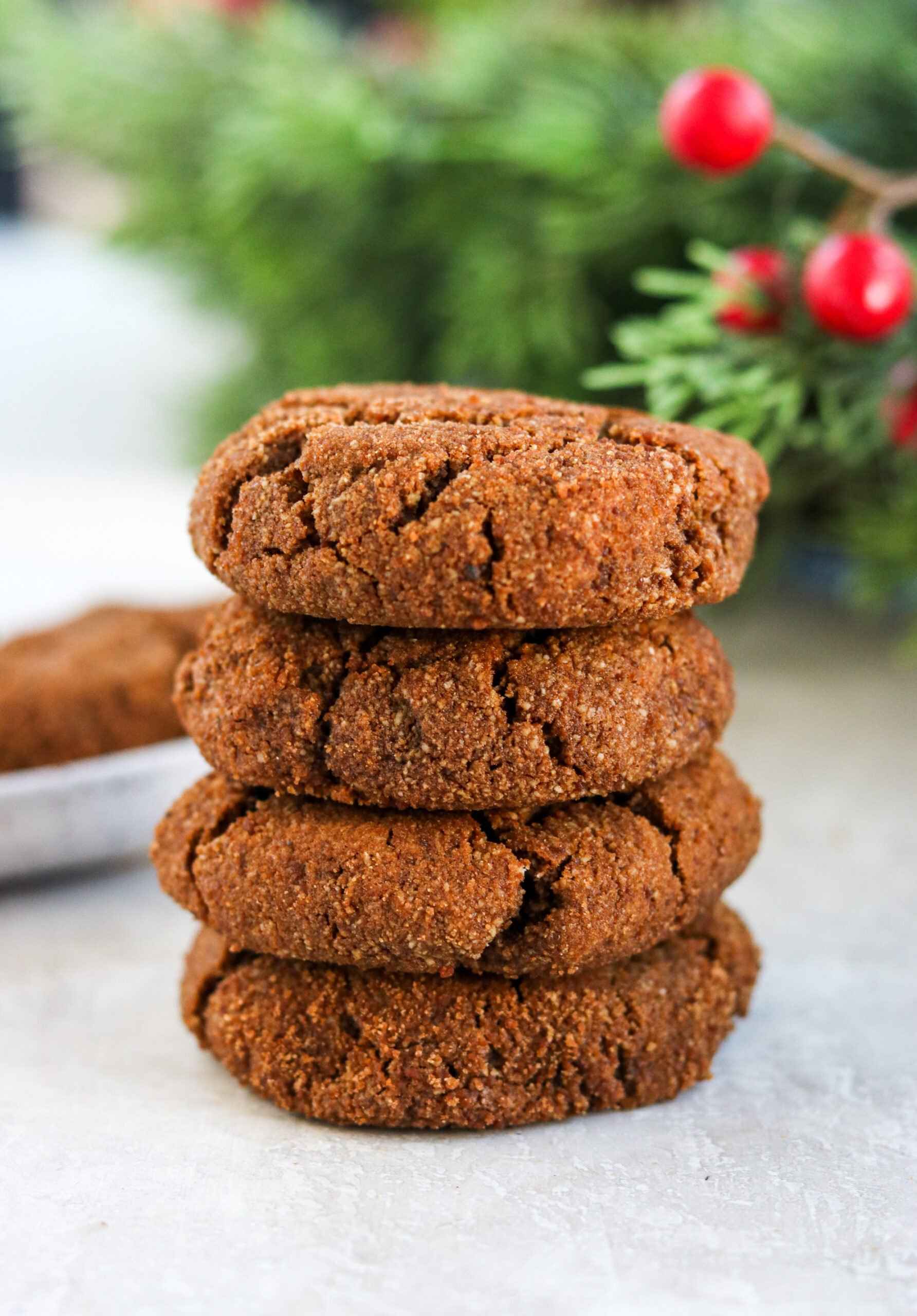 four gluten-free gingersnaps stacked on top of each other