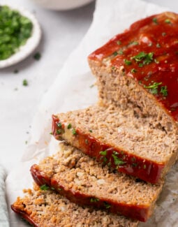 gluten free meatloaf topped with parsley and sliced