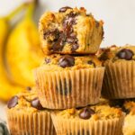 gluten free banana bread muffins stacked on top of each other