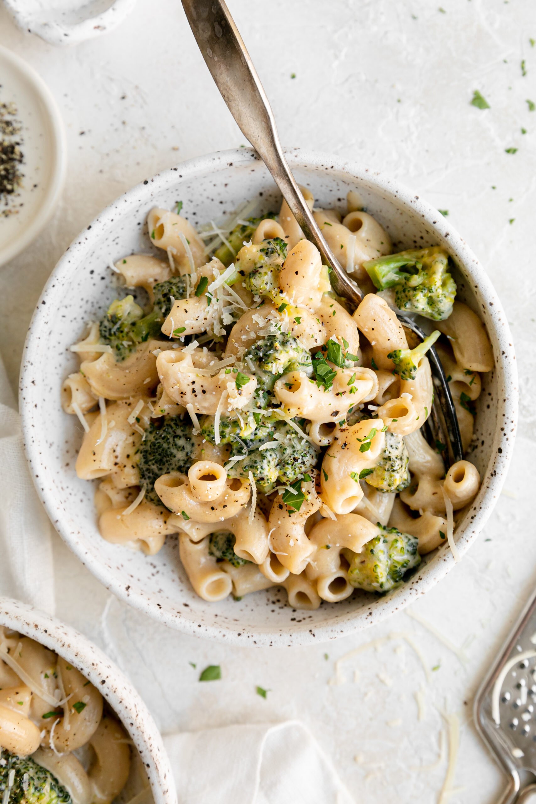 a bowl of gluten-free mac and cheese with broccoli