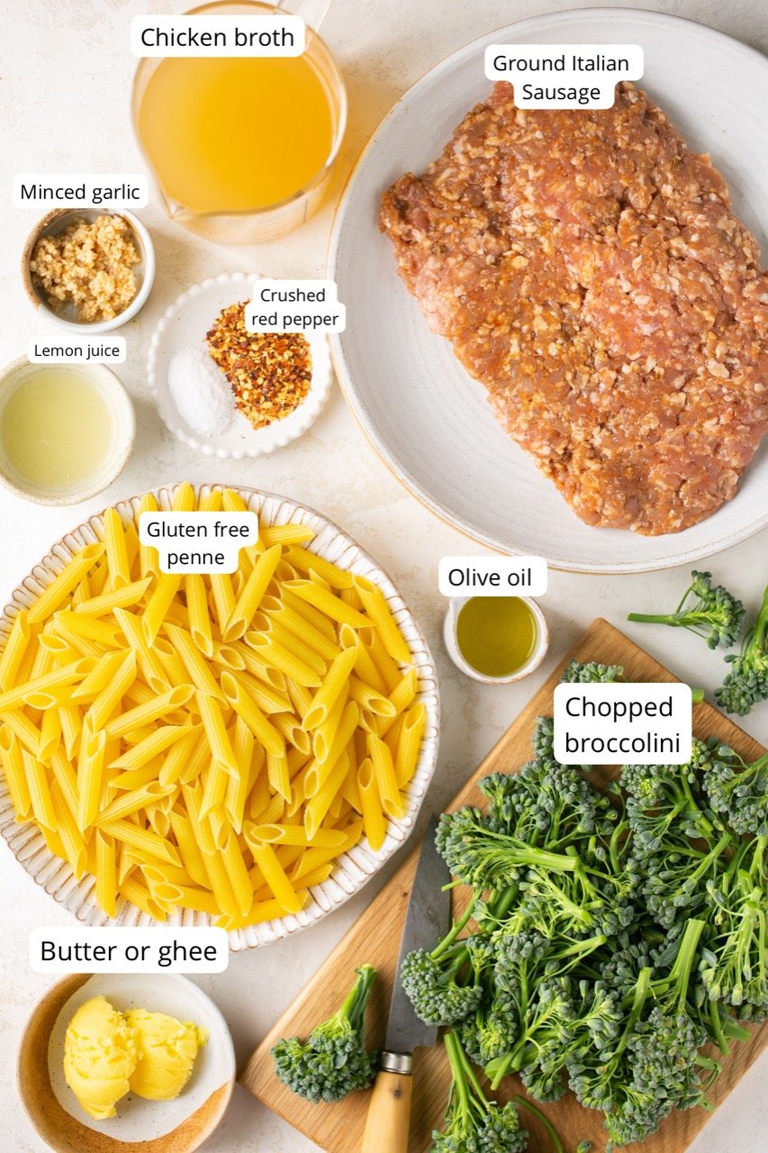 ingredients for sausage broccolini pasta in various size bowls
