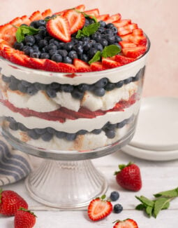 berry angel food trifle with mint in a glass bowl