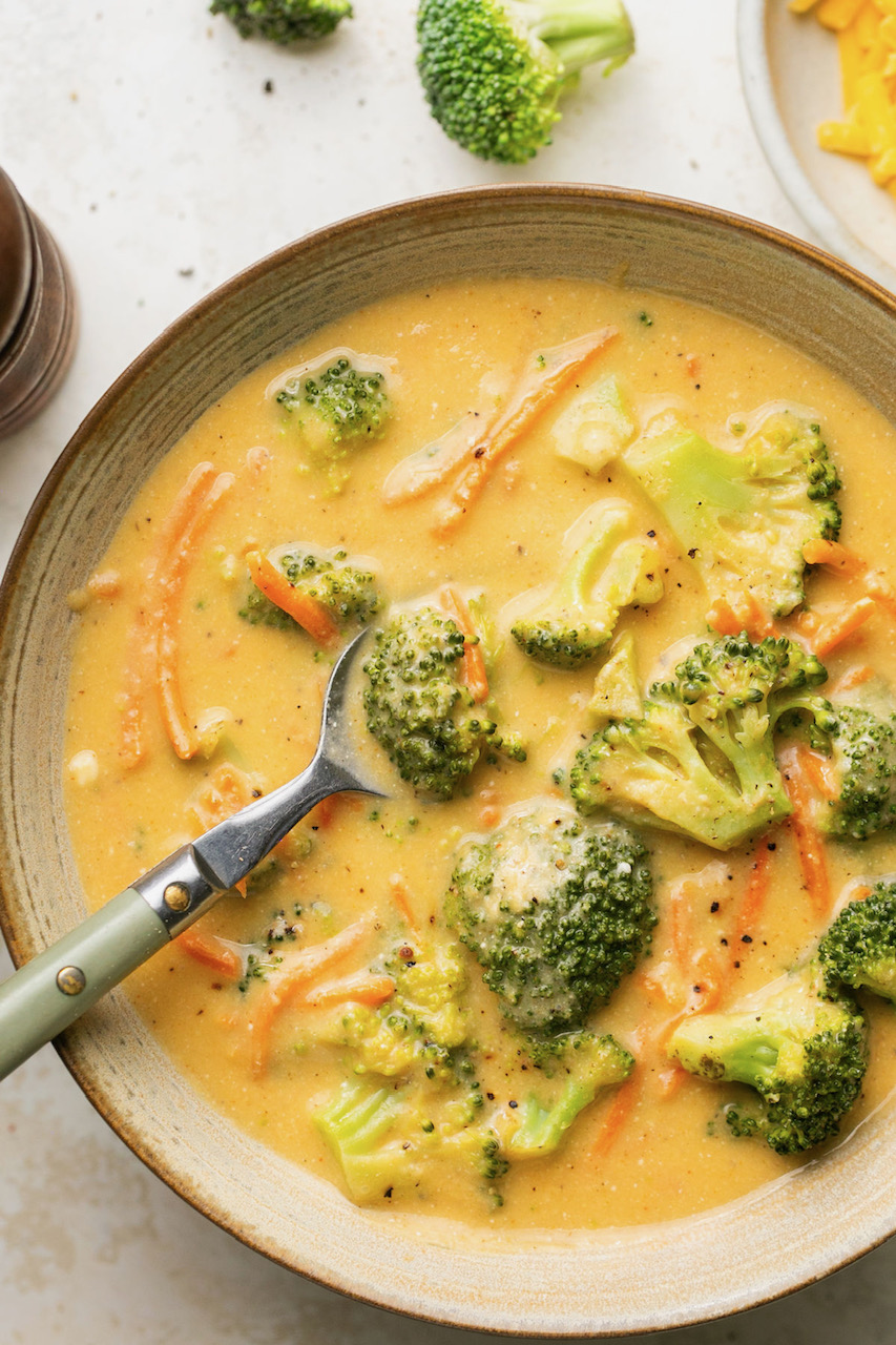 broccoli cheddar soup in a bowl with a spoon