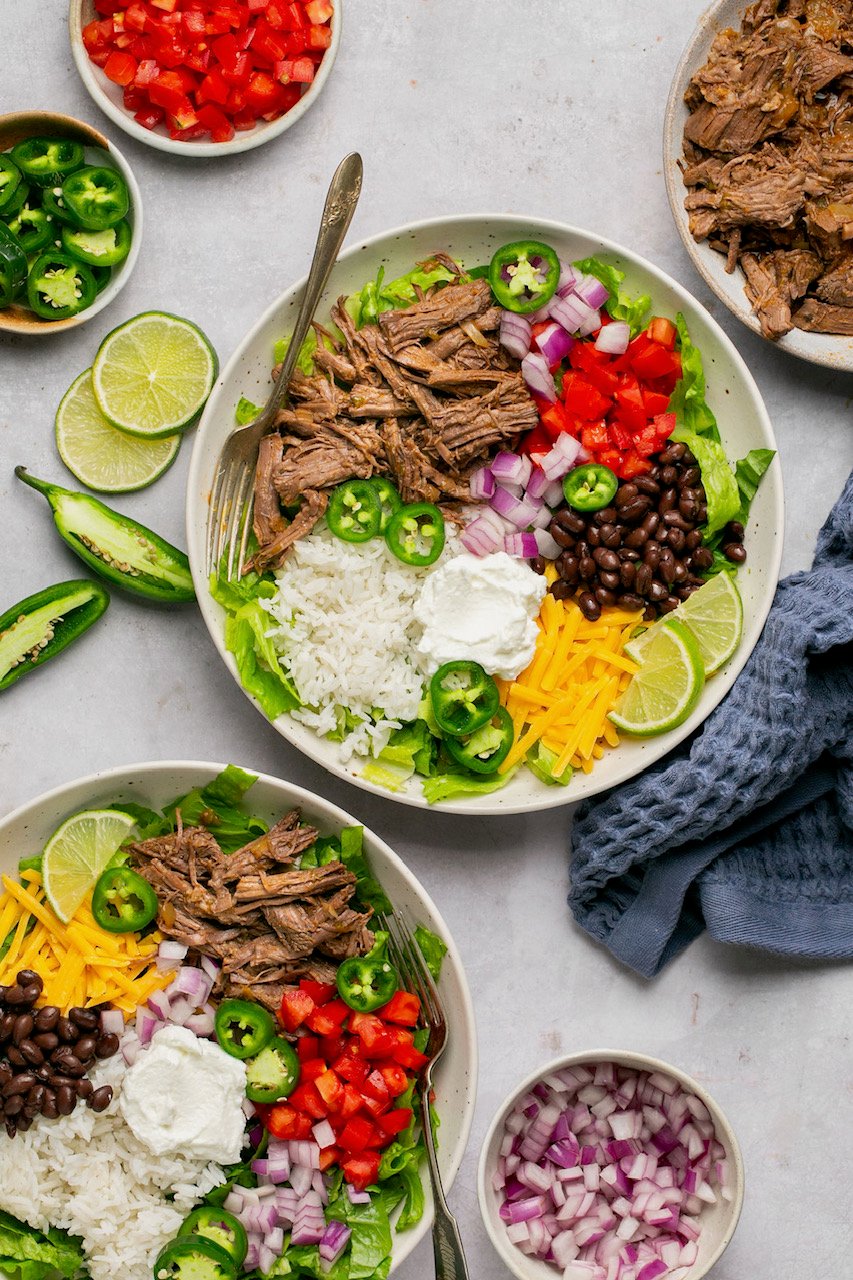 taco shredded beef burrito bowls with toppings