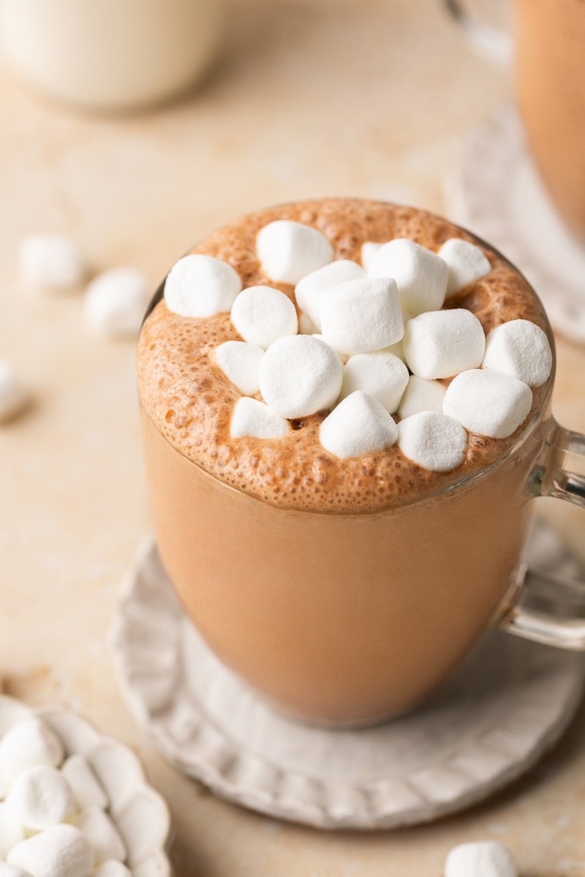 bone broth hot chocolate in a glass mug topped with marshmallows