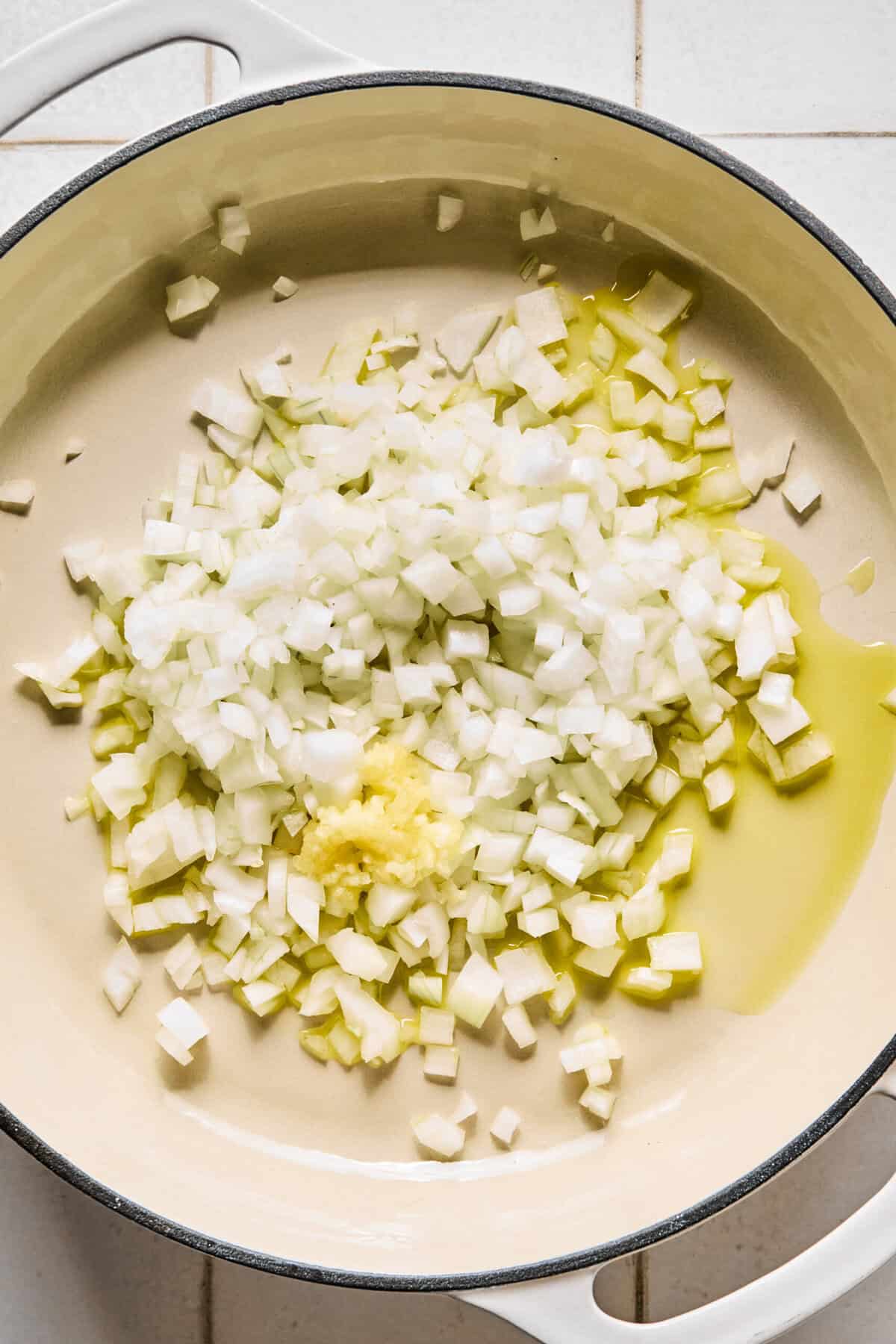 The onions and garlic in a large pan with olive oil.