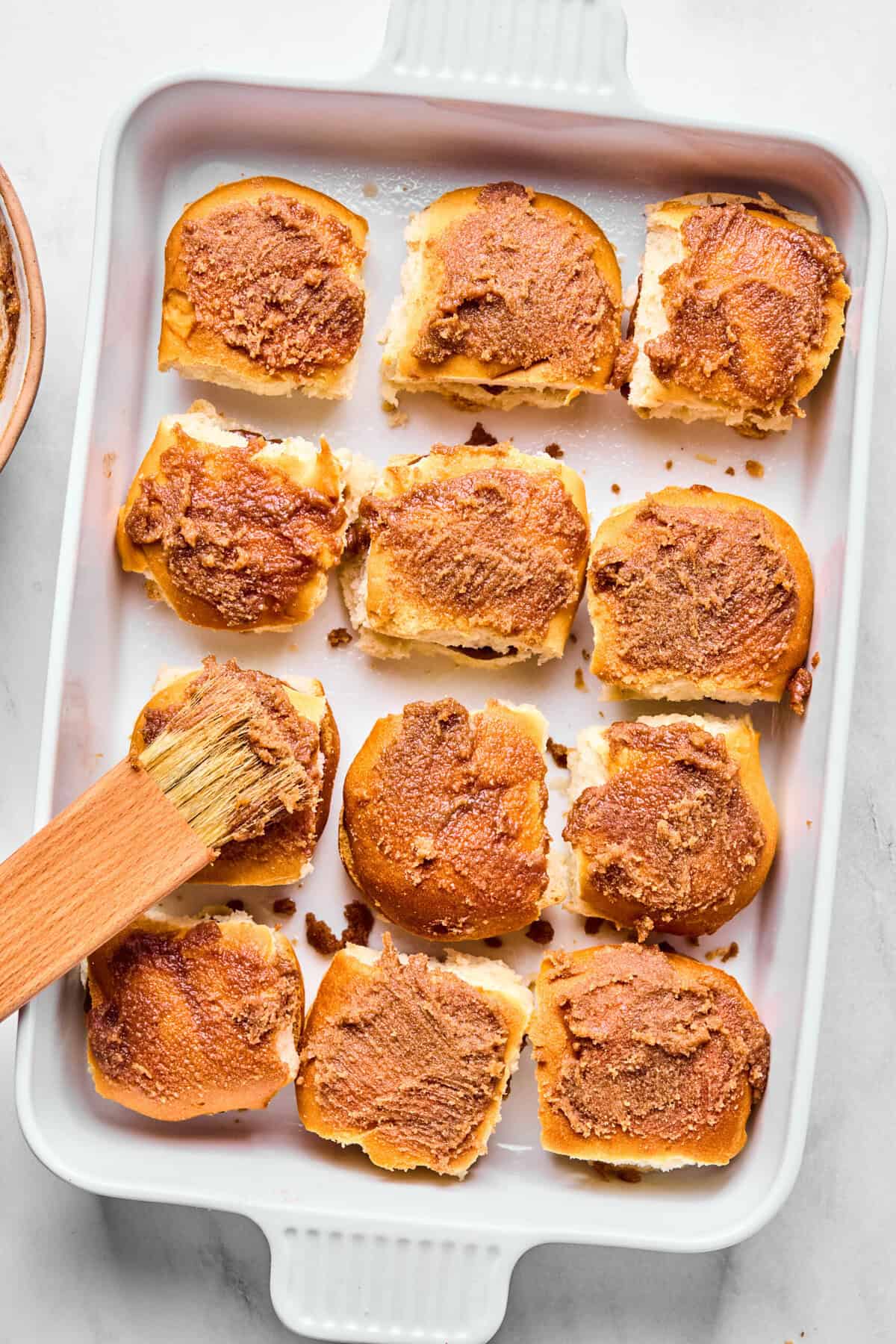 Hawaiian Rolls topped with cinnamon butter