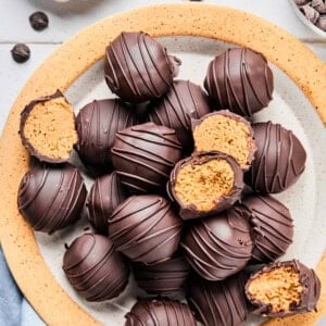 chocolate peanut butter balls on a plate