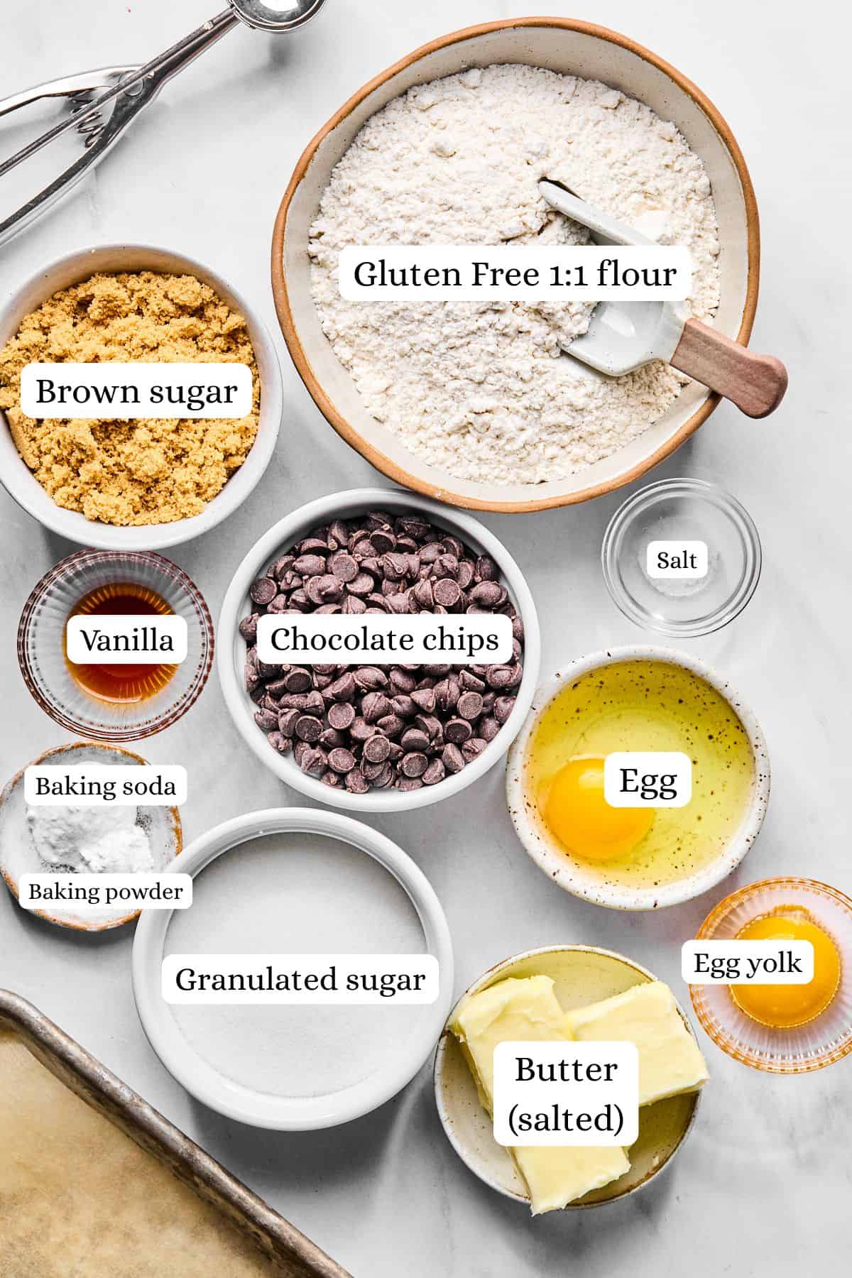 ingredients for gluten free chocolate chip cookies in nesting bowls