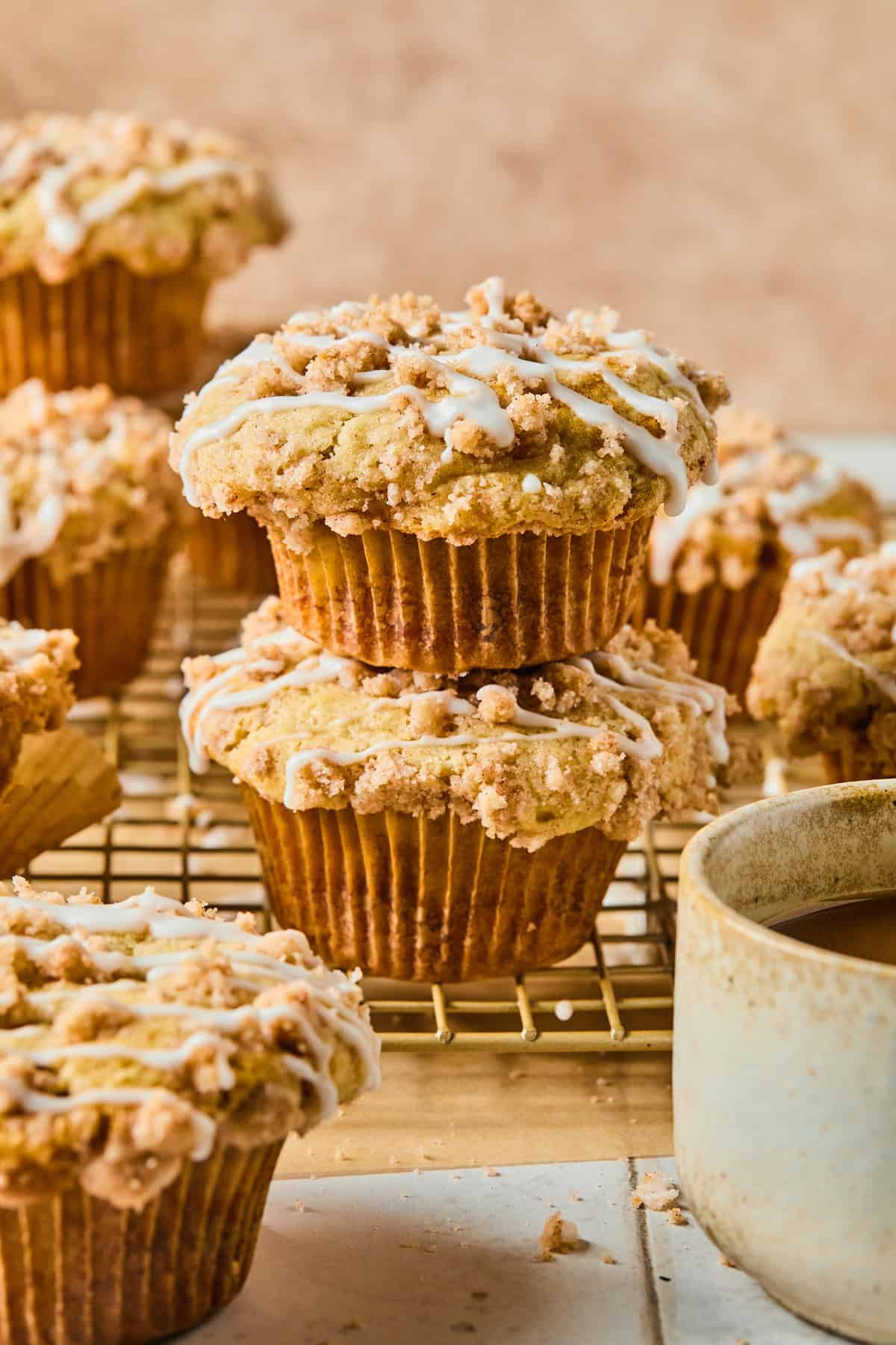 2 coffee cake muffins stacked on top of each other