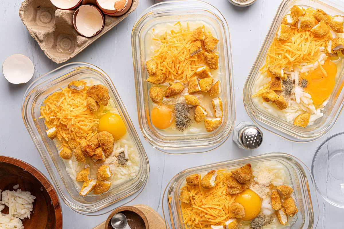 chicken, egg, and hash browns in meal prep containers