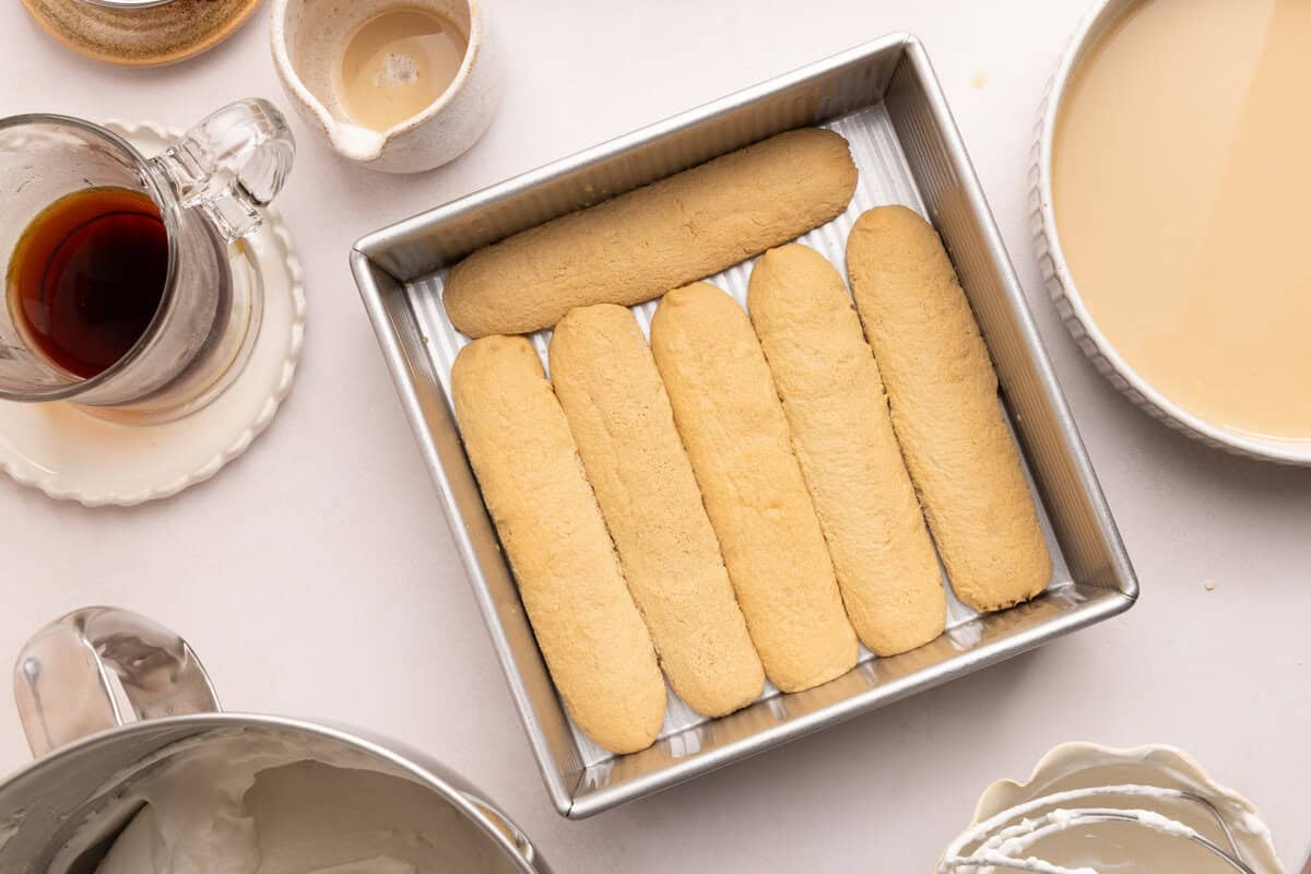 6 lady fingers in the bottom of a baking pan