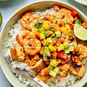 cilantro lime chicken and shrimp over rice with mango salsa
