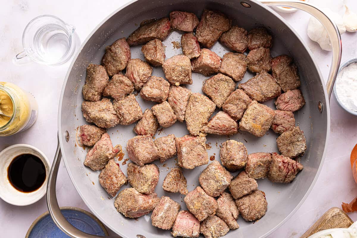 beef tips seared in a pan