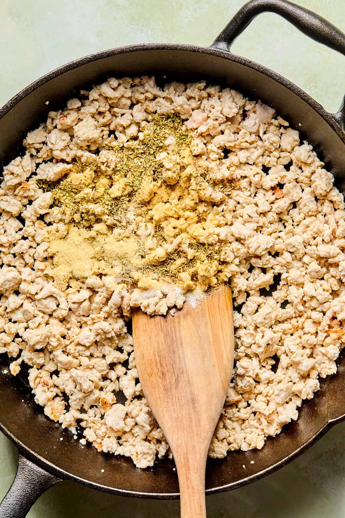 ground turkey in a skillet with seasonings
