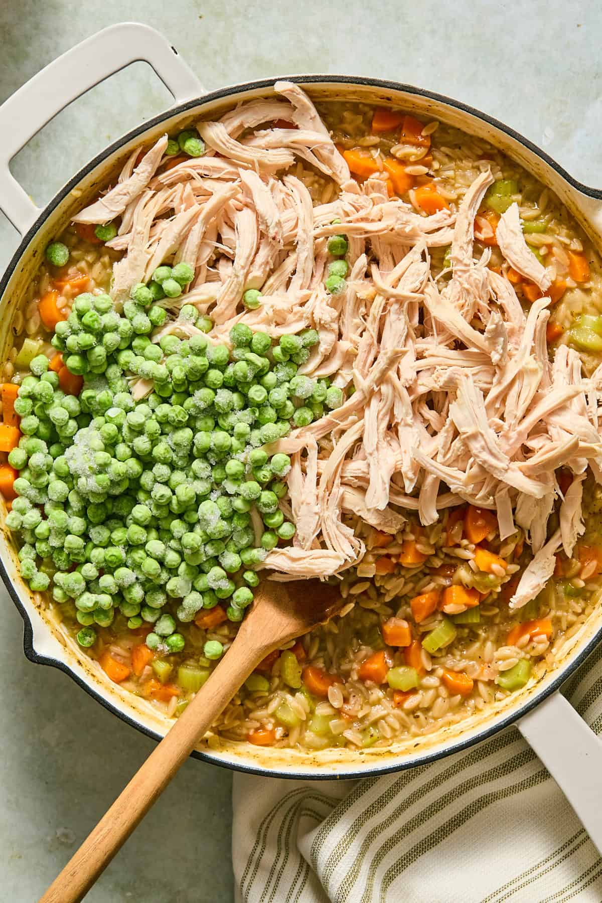 Peas and shredded chicken stirred into the cooked orzo.