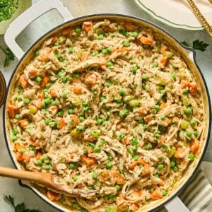 chicken pot pie orzo pasta in a skillet
