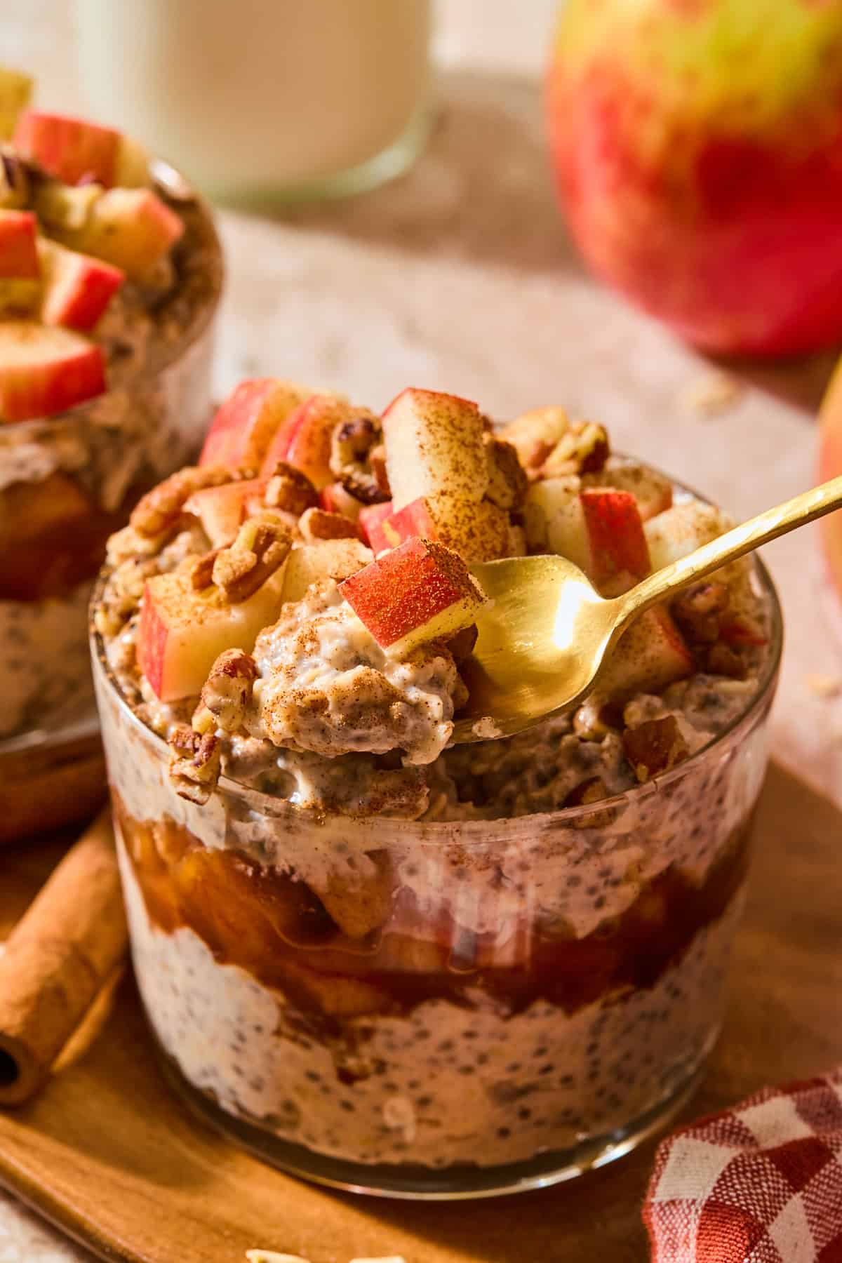 apple pie overnight oats with a spoon taking a scoop out