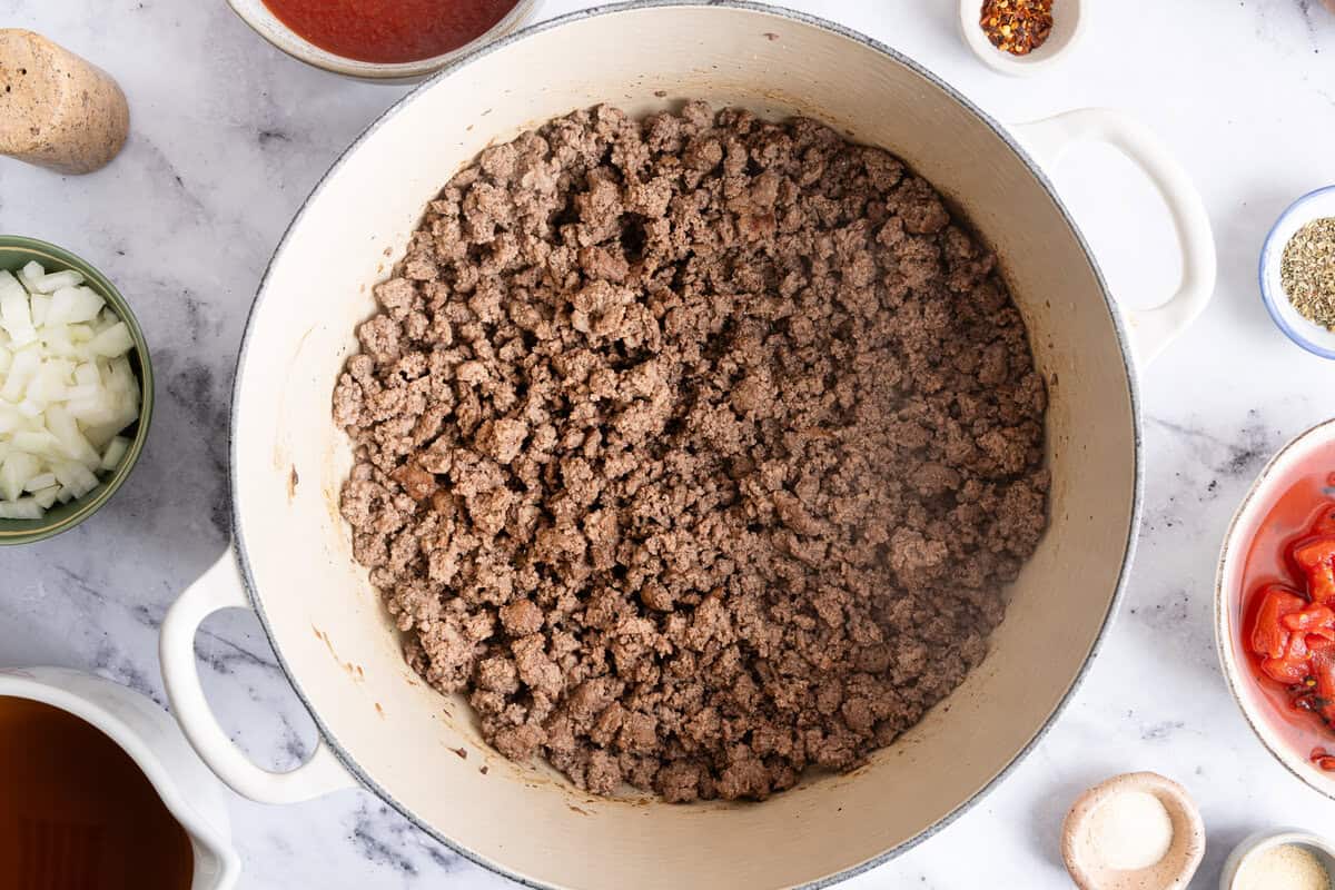 ground beef cooking in a skillet